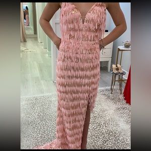 Beautiful Brand New Size 6- such a unique dress. Never Worn!